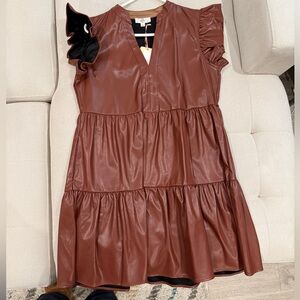 Brown leather boutique dress. New with tags.